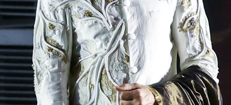 CORAL SHERWANI AND DRAPED SILK  DHOTI SET