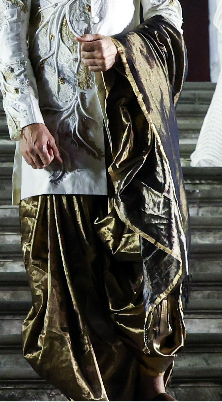 CORAL SHERWANI AND DRAPED SILK  DHOTI SET