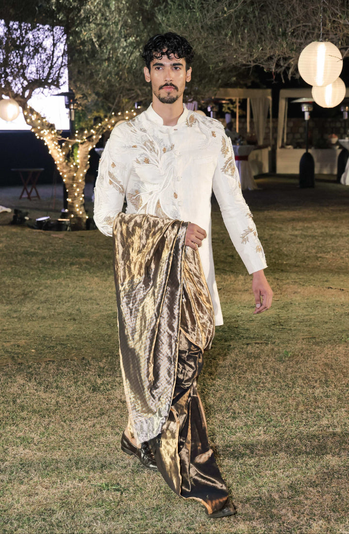 CORAL SHERWANI AND DRAPED SILK  DHOTI SET